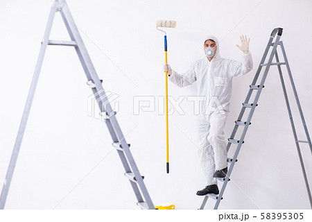Painter working at construction site Painter working at construction site 58395305