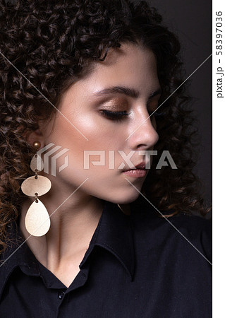 Beautiful teenager girl with afro curls and bright 58397036