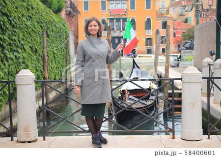 Girl in Venice on the weekend. Woman travels in 58400601