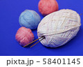 Woolen thread and knitting needle. 58401145