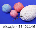 Woolen thread and knitting needle. 58401146