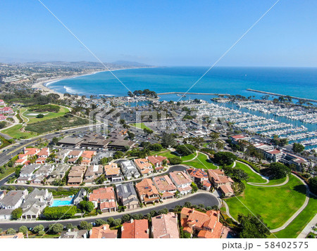 Aerial view of Dana Point Harbor town and beach Aerial view of Dana Point Harbor town and beach 58402575