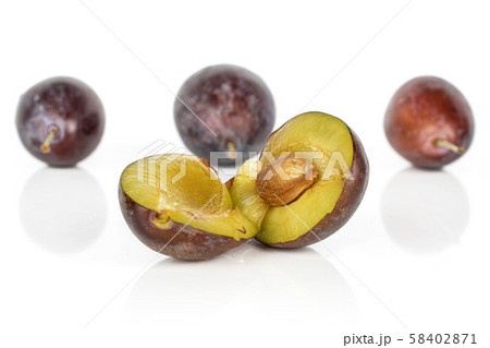 Sweet purple plum isolated on white 58402871