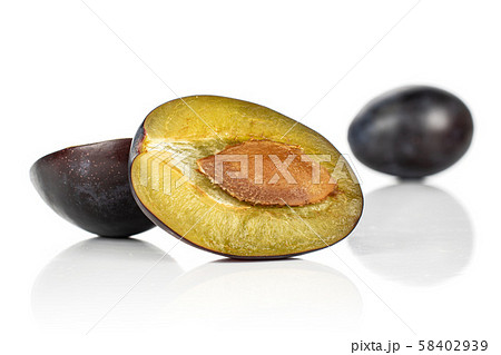 Fresh purple plum isolated on white 58402939