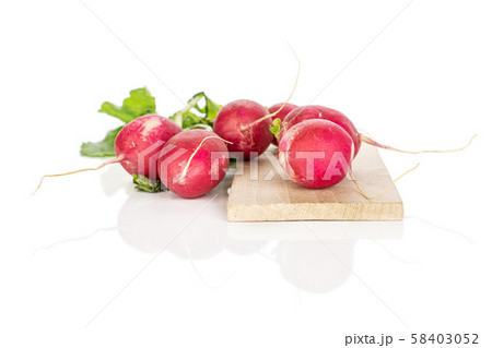 Fresh red radish isolated on white Fresh red radish isolated on white 58403052