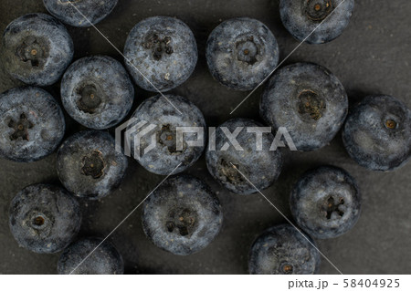 Fresh blueberry on grey stone Fresh blueberry on grey stone 58404925