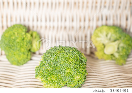Fresh green broccoli with braided rattan 58405491