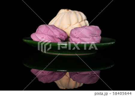Fresh pastel sweet zefir isolated on black glass 58405644