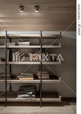 Light illuminated interior with sloping wooden ceiling 58405994