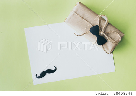 Father's day. Gift package wrapped with paper and 58408543
