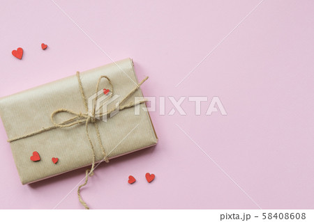Present wrapped in brown craft paper and tie hemp 58408608