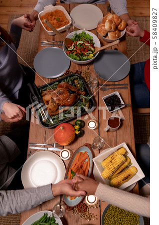 Millennial adult friends celebrating Thanksgiving together at home 58409827