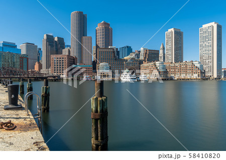 Boston skyline from Fan Pier at the afternoon with smooth water river, Massachusetts, USA downtown skyline, United state of America, Architecture and building with tourist concept 58410820