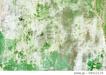 Texture of a concrete wall with cracks and scratches which can be used as a background Texture of a concrete wall with cracks and scratches which can be used as a background 58412174