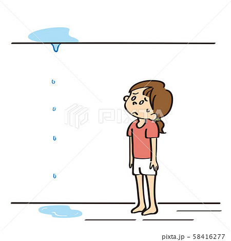 天井からの水漏れを呆然と見る女性 58416277