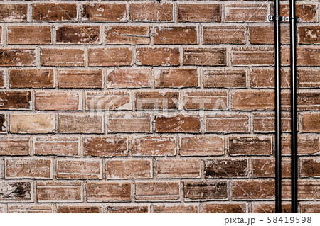 brick wall with cable steel pipe old grunge texture background 58419598