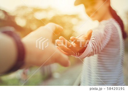 Girl teen smiling and reach her hand. Help Touch 58420191