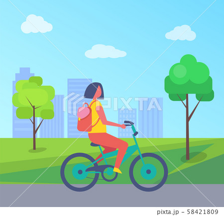 Woman Riding on Bike at Green Trees and Houses 58421809