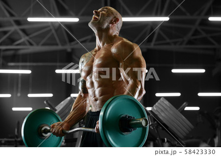 Handsome strong athletic men pumping up biceps Handsome strong athletic men pumping up biceps 58423330