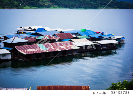 Top view from the historical bridge over the river and the raft restaurant 58432783