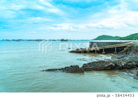 A large fishing boat stranded A large fishing boat stranded 58434453