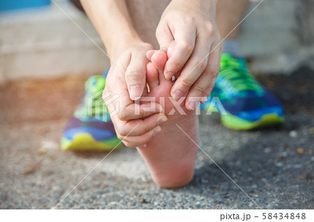 Man runner athlete foot injury and pain. Man 58434848