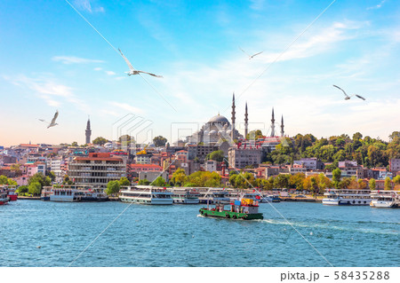 Eminonu Pier and Suleymaniye Mosque in Istanbul, Turkey Eminonu Pier and Suleymaniye Mosque in Istanbul, Turkey 58435288