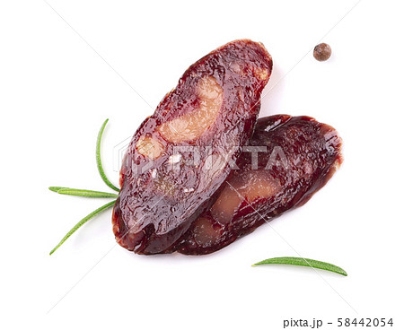 Horse sausage slice with rosemary and pepper. Tasty dried sausage, close-up, isolated on white Horse sausage slice with rosemary and pepper. Tasty dried sausage, close-up, isolated on white 58442054