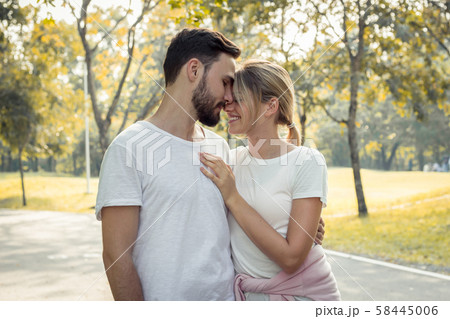 Couples show love to each other in the park. 58445006