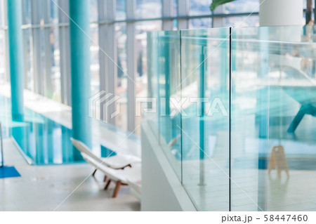 Abstract blur luxury indoor swimming pool background 58447460