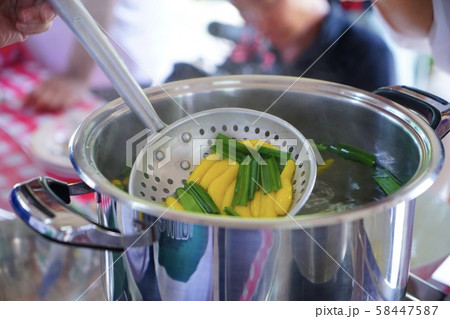 Making Thai desserts is a charm of Thai women. Making Thai desserts is a charm of Thai women. 58447587