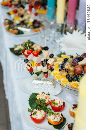 catering services background with snacks on guests table in restaurant at event party catering services background with snacks on guests table in restaurant at event party 58449880