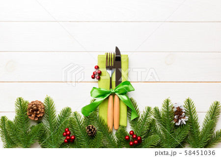 Top view of festive cutlery on new year wooden Top view of festive cutlery on new year wooden 58451036