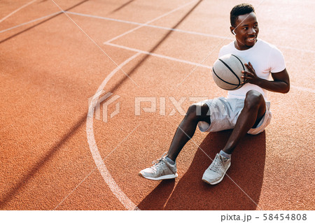 Sporty African American resting after a workout 58454808