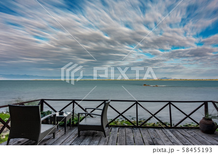 Sunrise at lake Malawi with cloudy sky, long exposure Sunrise at lake Malawi with cloudy sky, long exposure 58455193