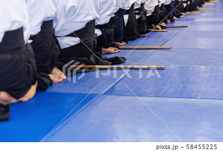People in kimono on martial arts weapon training seminar People in kimono on martial arts weapon training seminar 58455225