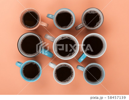 Coffee in the different cups on the beige Coffee in the different cups on the beige 58457139