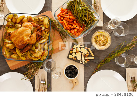 Roast turkey with vegetables on the table 58458106