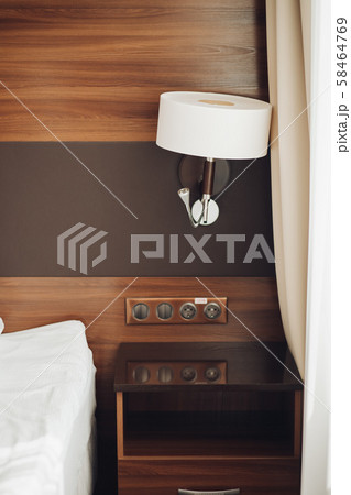 Modern night lamp and bedside table with sockets Modern night lamp and bedside table with sockets 58464769