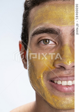 Happy young man caring of his skin Happy young man caring of his skin 58466690
