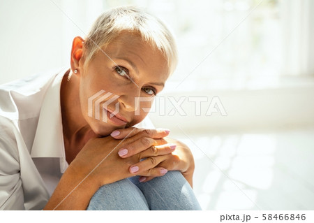 Amazing aged female person being deep in thoughts 58466846