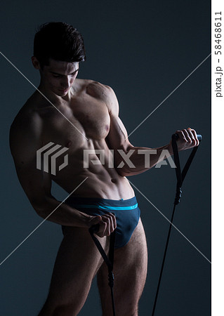 Muscular fitness young male antique perfect muscles six packs of abs and bare chest. Bodybuilder Muscular fitness young male antique perfect muscles six packs of abs and bare chest. Bodybuilder 58468611