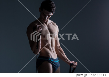 Muscular fitness young male antique perfect muscles six packs of abs and bare chest. Bodybuilder Muscular fitness young male antique perfect muscles six packs of abs and bare chest. Bodybuilder 58468614