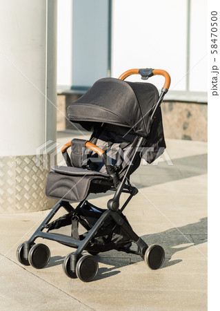 Baby stroller standing on the street, new design. Baby stroller standing on the street, new design. 58470500