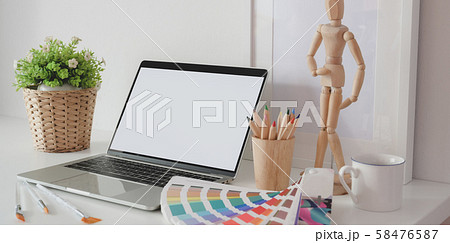 Modern artist creative studio with blank screen Modern artist creative studio with blank screen 58476587
