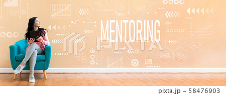 Mentoring with woman using a tablet 58476903