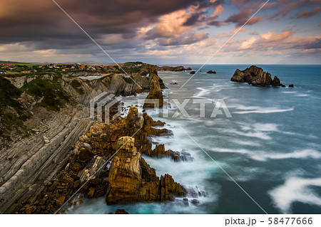 Dramatic view of Playa de la Arnia, Cantabria, Spain. 58477666