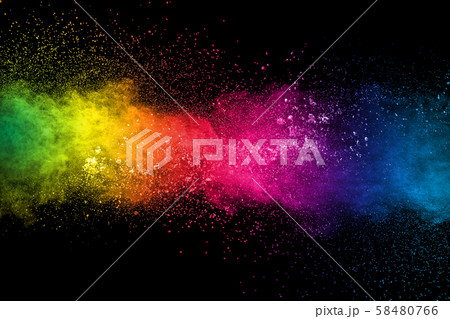 Multi colored dust splash on black background.Painted Holi. 58480766