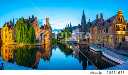 Bruges skyline with old buildings at night in Bruges, Belgium. 58481633