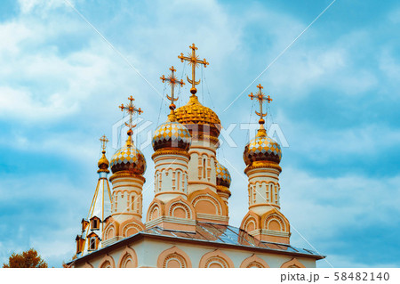 Russian Church Golden domes in the blue sky Russian Church Golden domes in the blue sky 58482140
